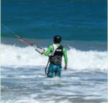 Enter and exit the water while controlling the kite