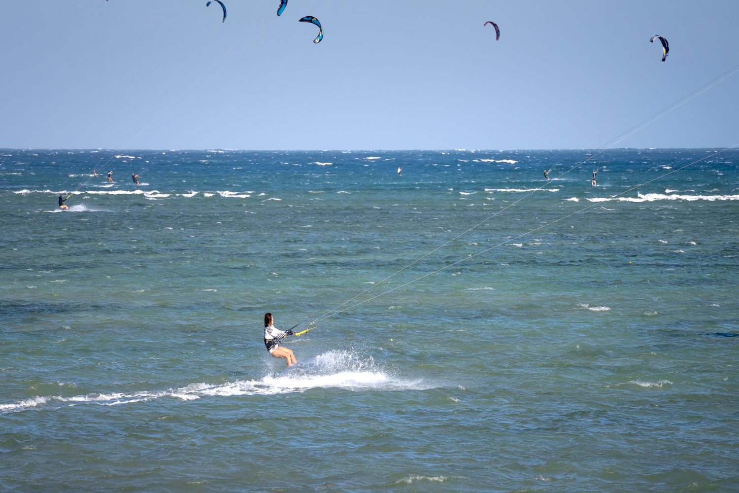 Kites over open ocean swell
